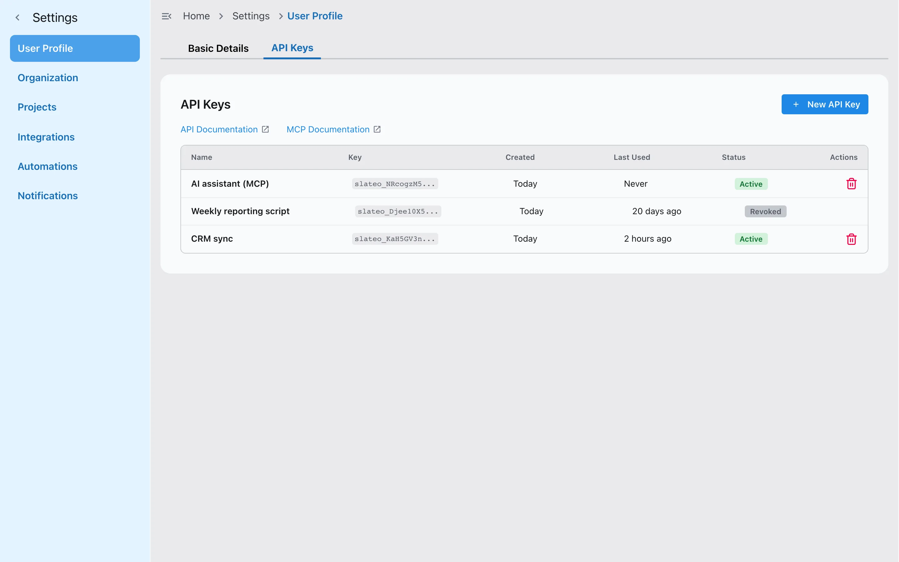 API keys in Slateo: an active key for a CRM sync, a revoked reporting key and a key for an AI assistant over MCP, with links to the API and MCP docs.
